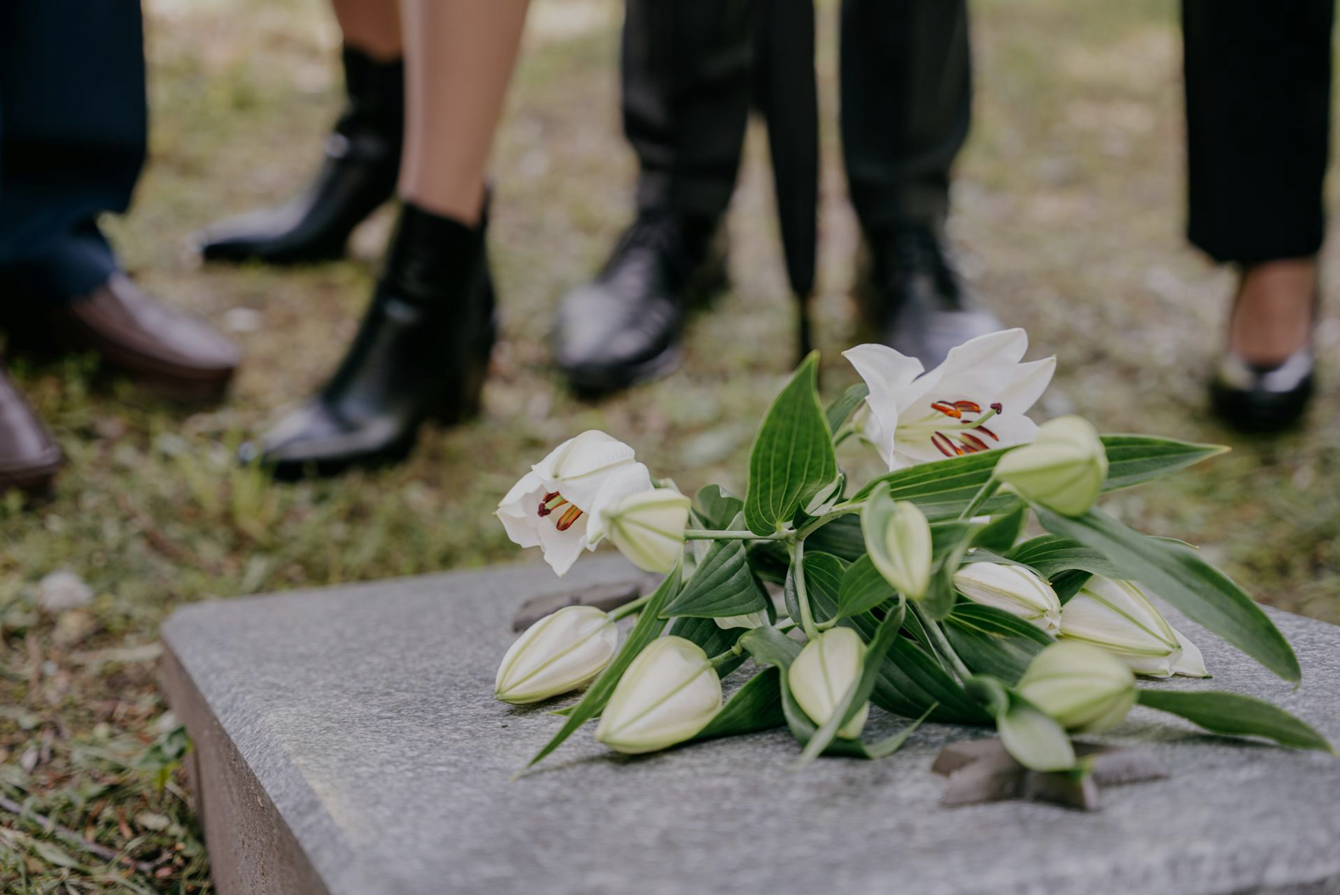 People at a funeral symbolizing grief and loss